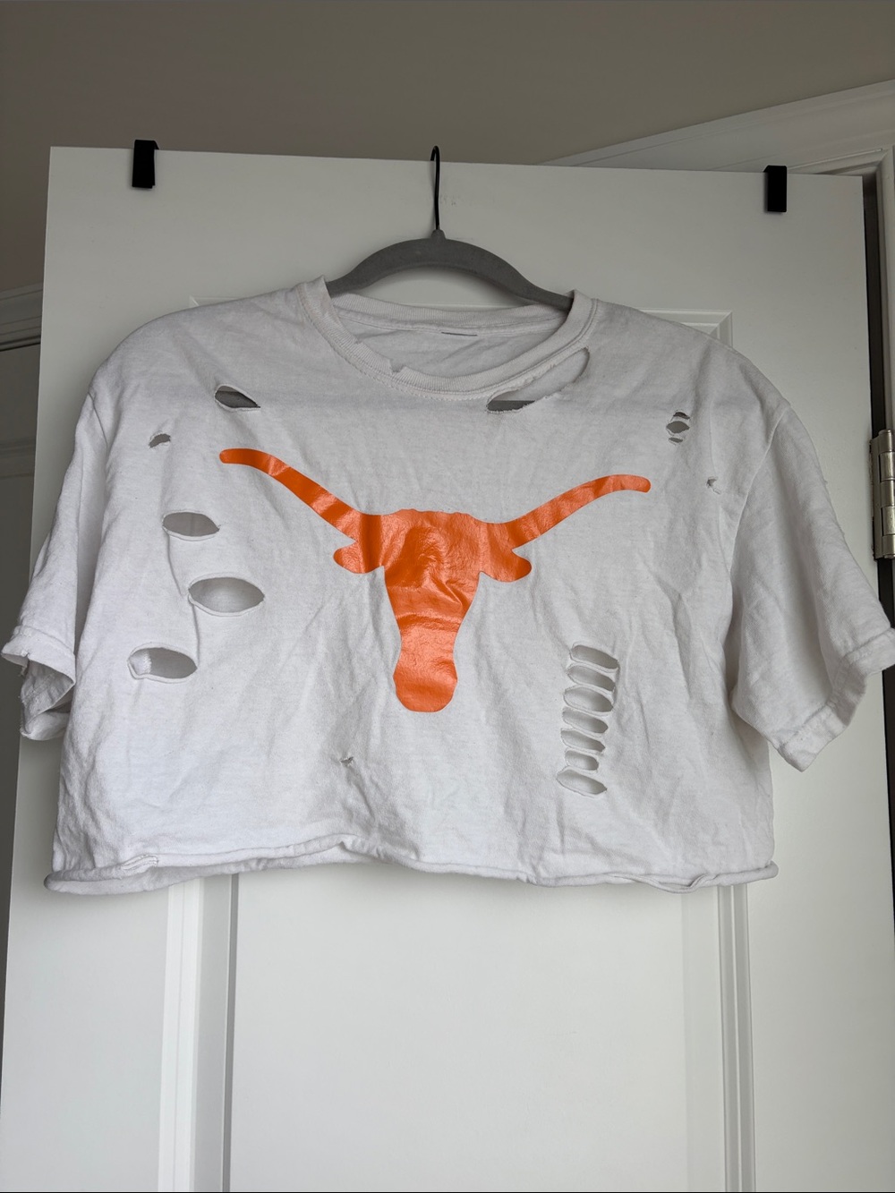 White Distressed Crop Top with Orange Longhorn Graphic